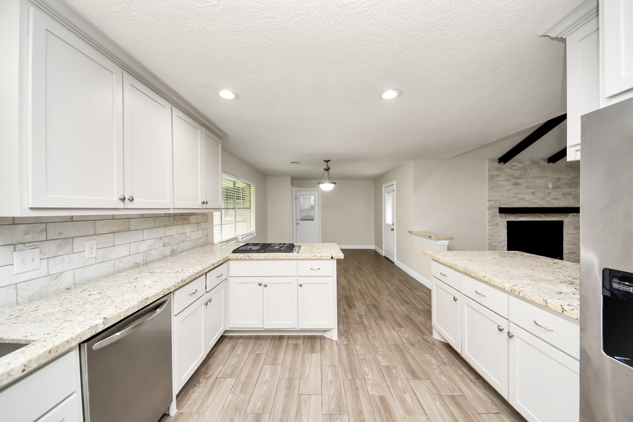 19435 Interstate 45 Spring, TX 77388 - Photo 7 of 24 a kitchen with a sink stove and cabinets