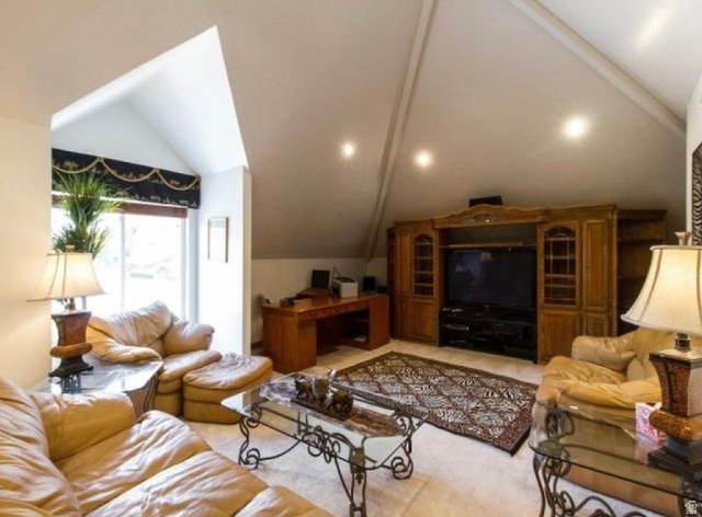 1085 Windsor Drive Provo, UT 84604 - Photo 42 of 83 Living area with vaulted ceiling and recessed lighting