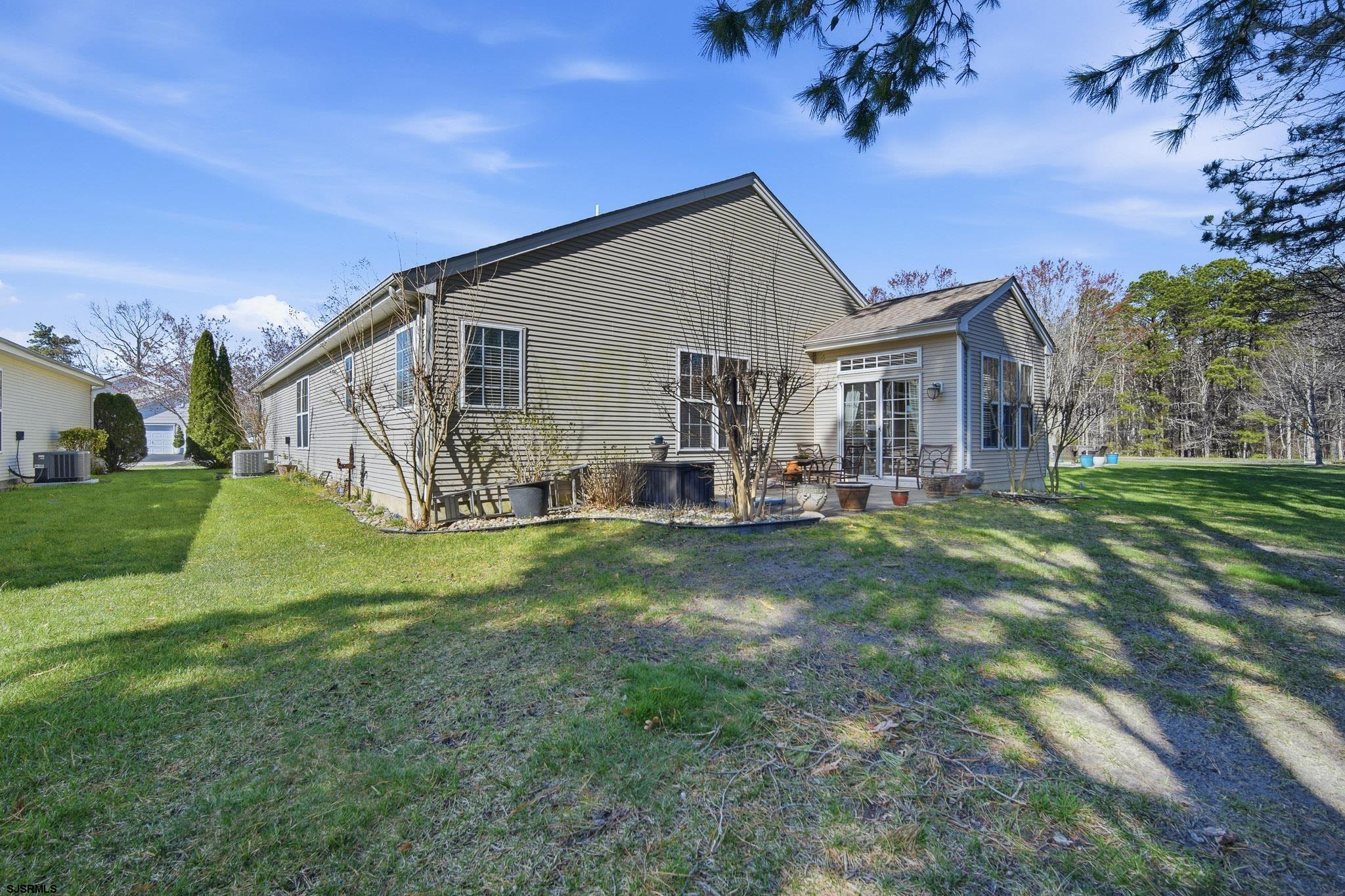 102 Warwick Road Galloway Township, NJ 08205 - Photo 3 of 45 a view of a house with a yard