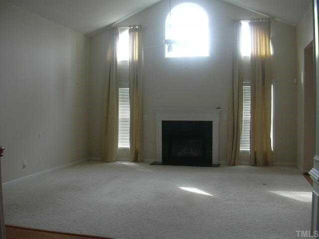 4304 White Chapel Way Raleigh, NC 27615 - Photo 4 of 12 Large family room with volume ceiling