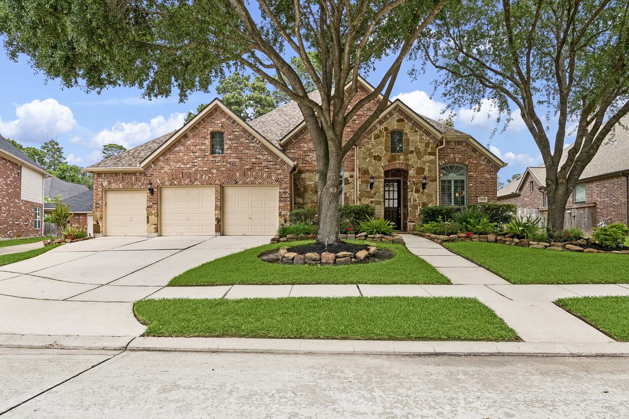 12523 Cedar Key Trail Humble, TX 77346 - Photo 1 of 33 a front view of a house with a yard and garage
