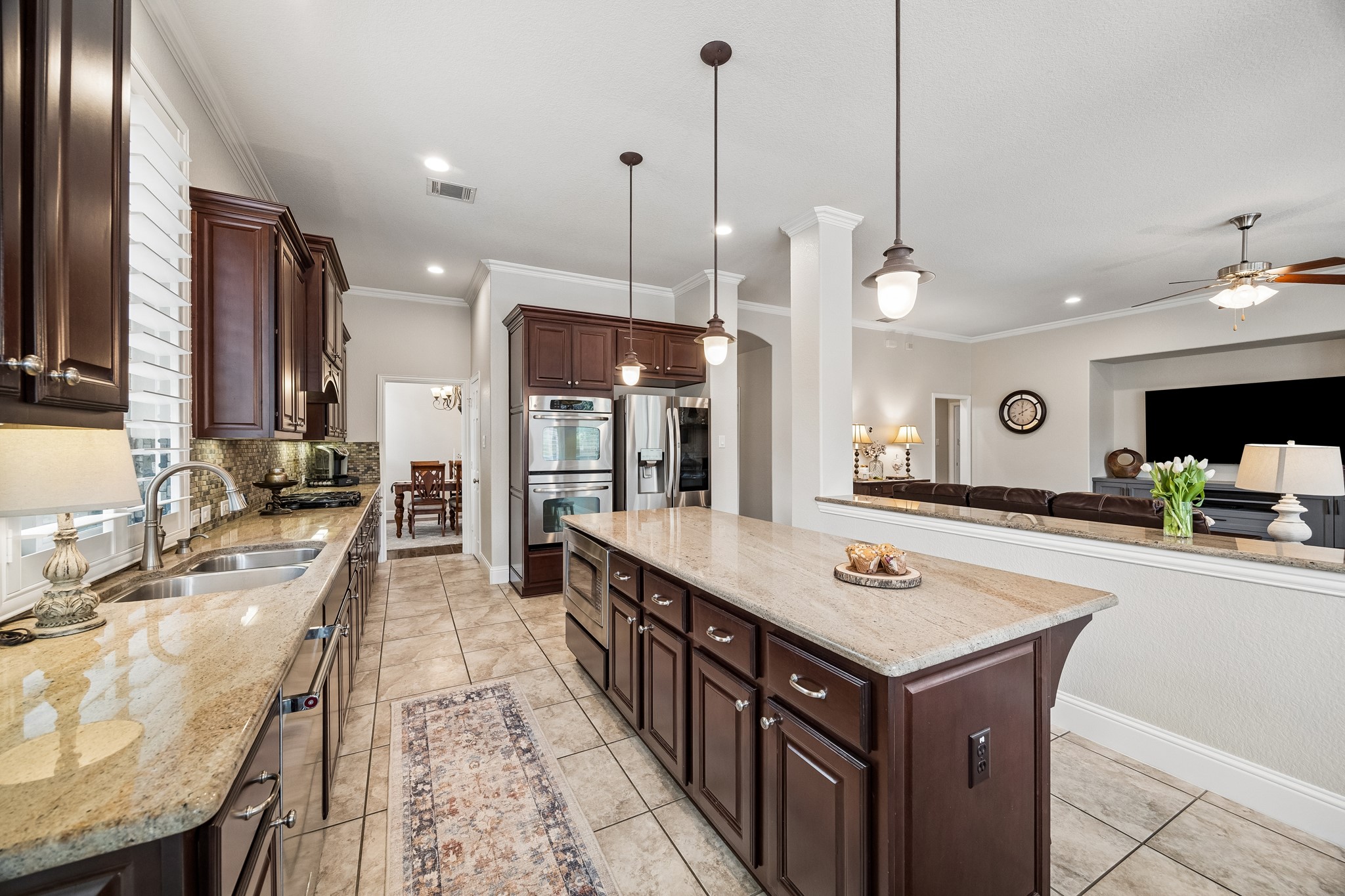 12523 Cedar Key Trail Humble, TX 77346 - Photo 11 of 33 a large kitchen with kitchen island a large island in it
