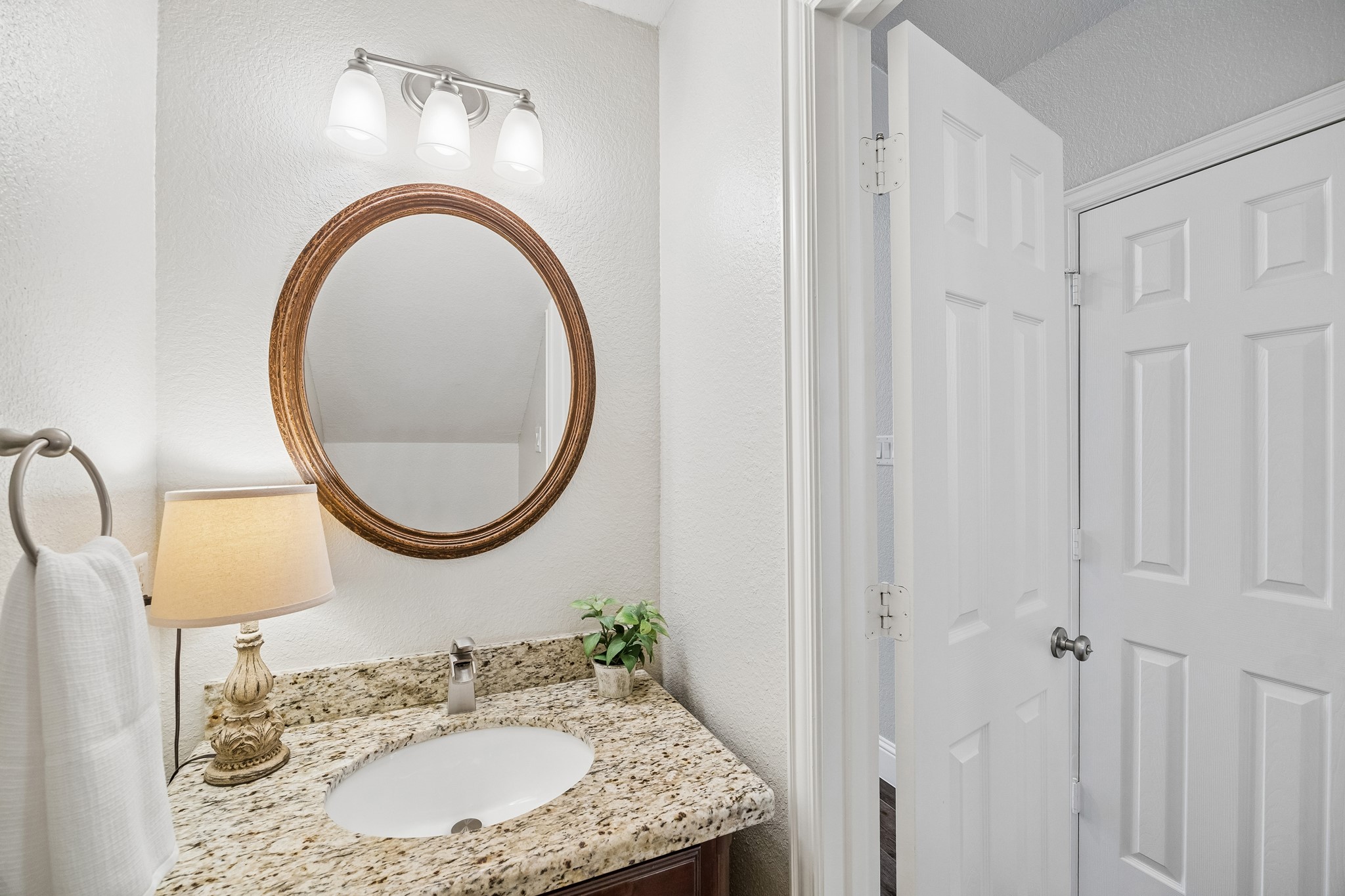 12523 Cedar Key Trail Humble, TX 77346 - Photo 13 of 33 a bathroom with a sink and a mirror