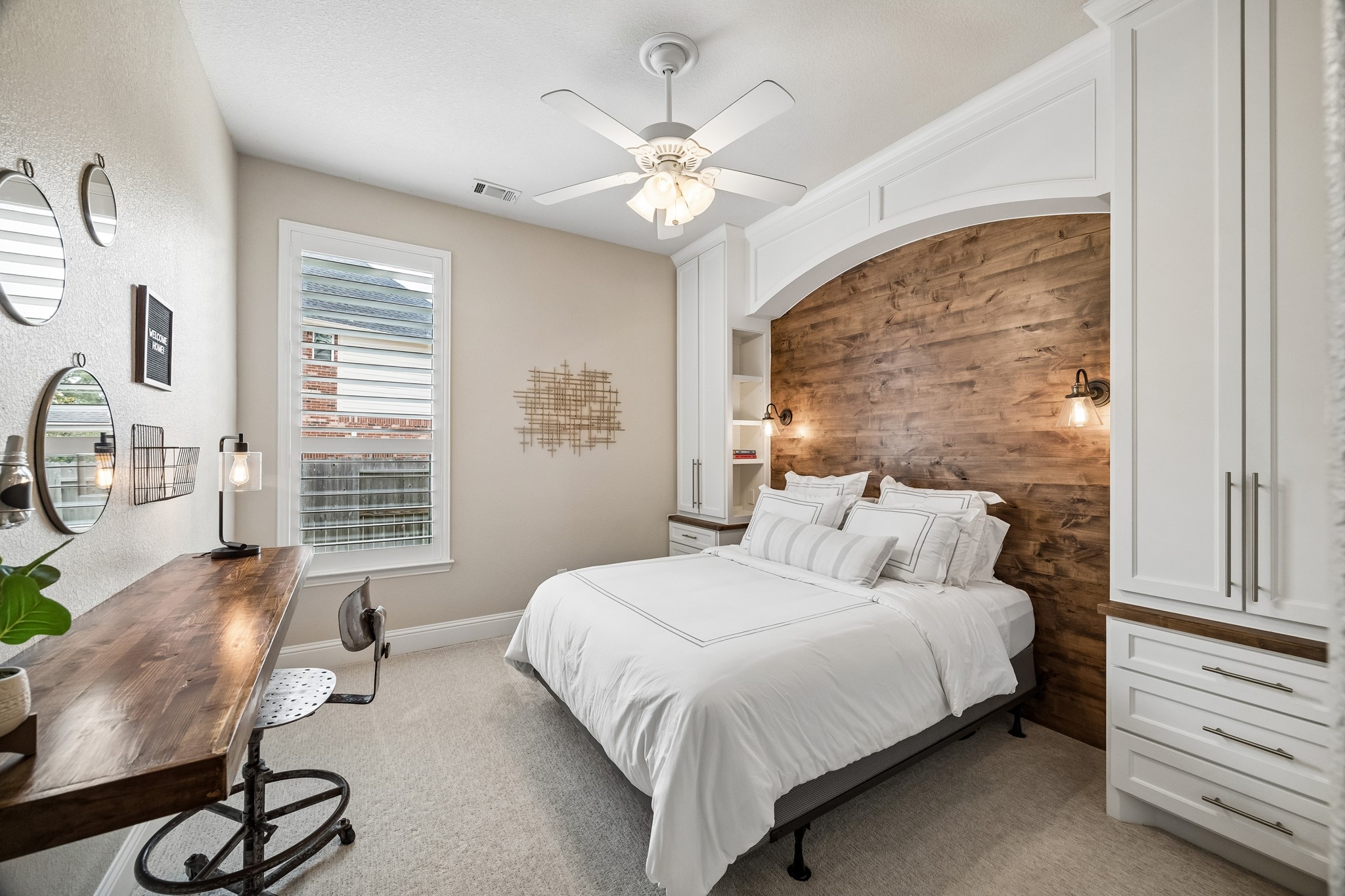 12523 Cedar Key Trail Humble, TX 77346 - Photo 19 of 33 a bedroom with a bed a chandelier and a large window with the outer view