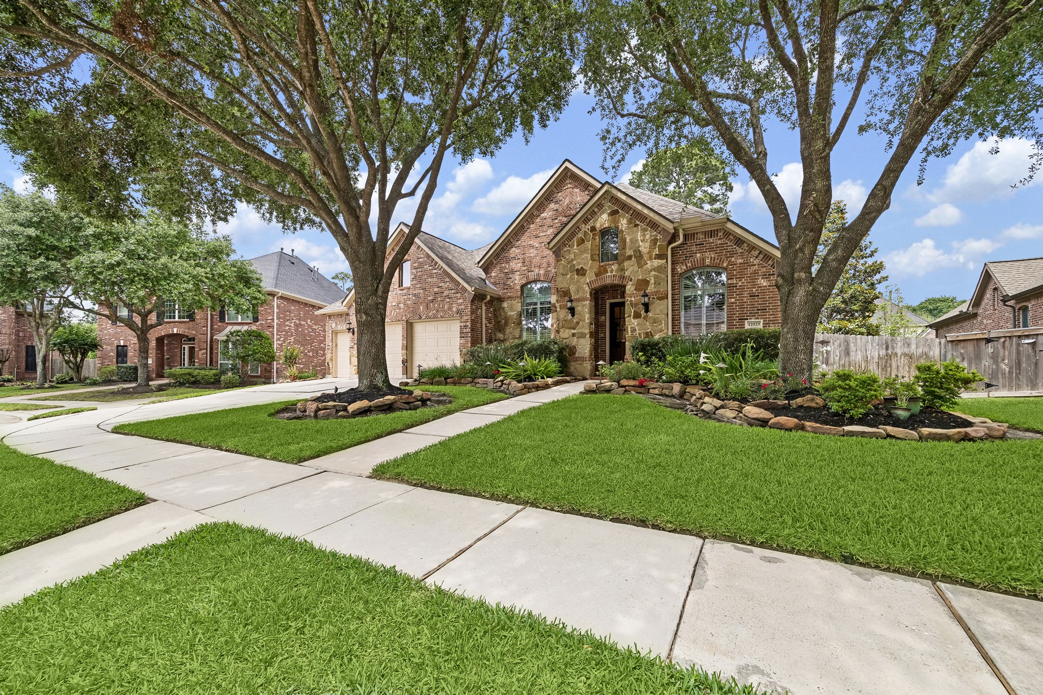 12523 Cedar Key Trail Humble, TX 77346 - Photo 2 of 33 a front view of a house with a yard