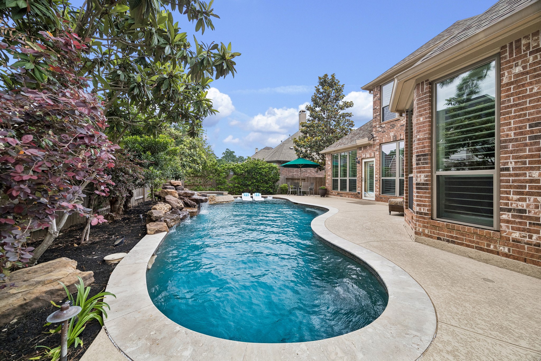 12523 Cedar Key Trail Humble, TX 77346 - Photo 29 of 33 a view of a house with swimming pool