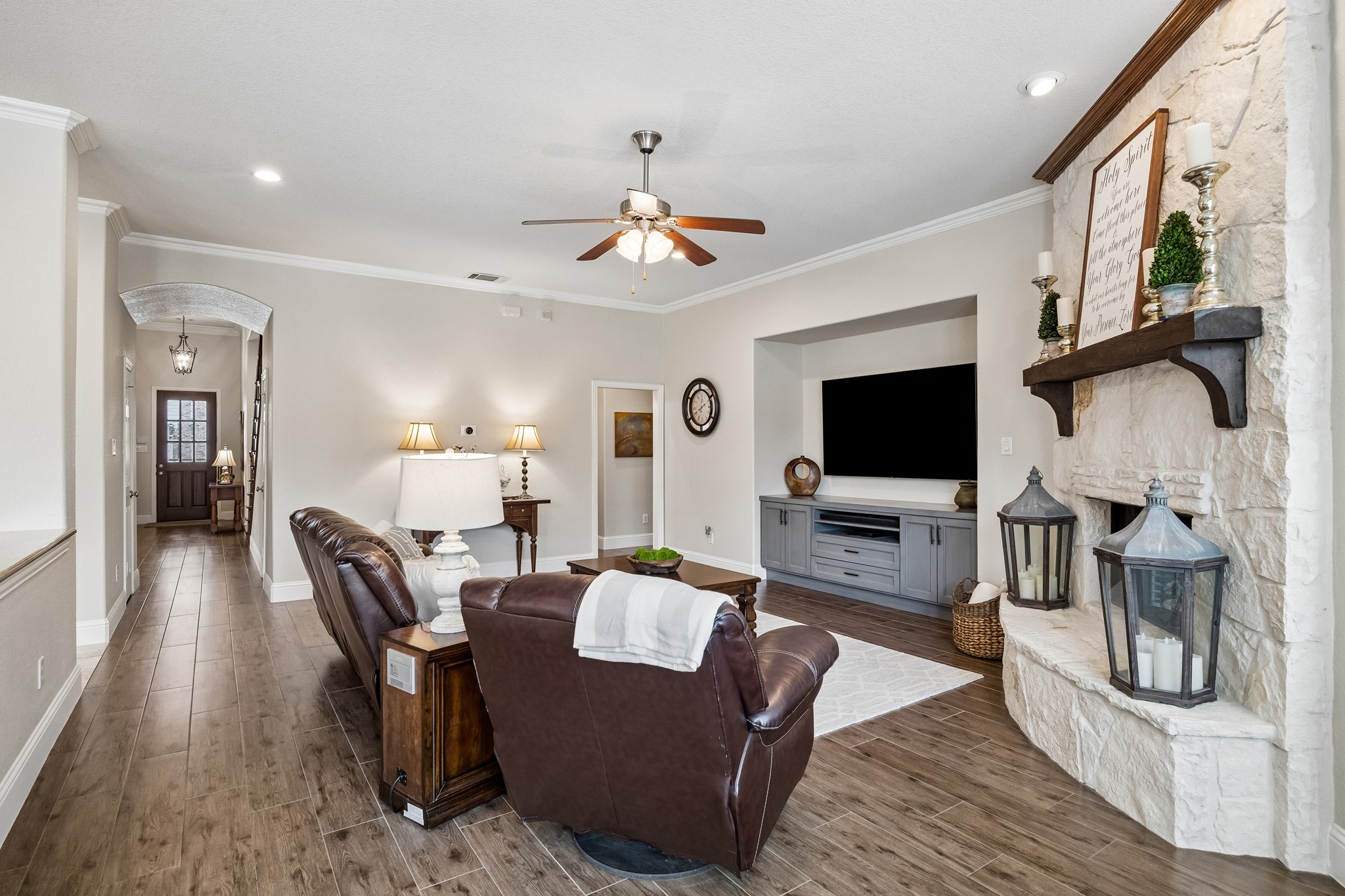 12523 Cedar Key Trail Humble, TX 77346 - Photo 8 of 33 a living room with furniture and a flat screen tv