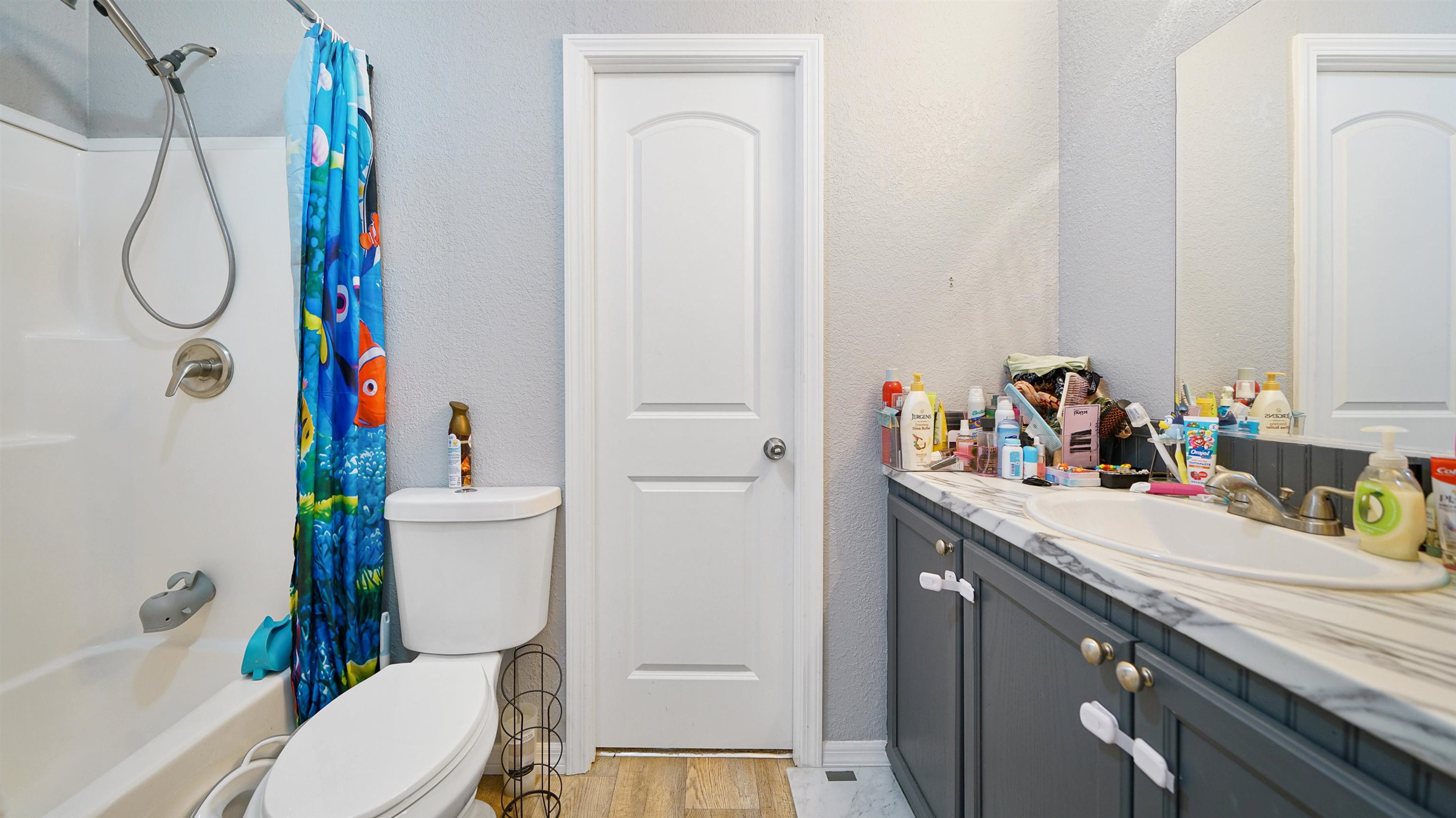 117 Jack Road Palatka, FL 32177 - Photo 19 of 34 a bathroom with a sink vanity mirror and toilet