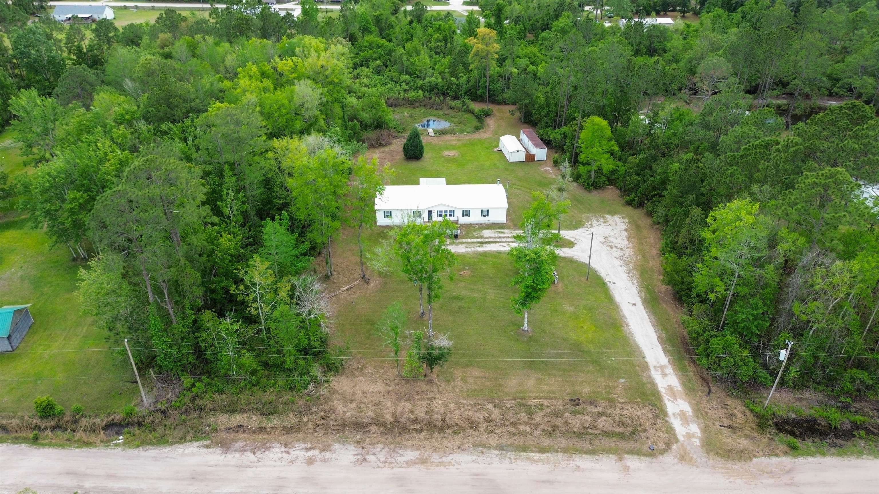117 Jack Road Palatka, FL 32177 - Photo 2 of 34 an aerial view of a house