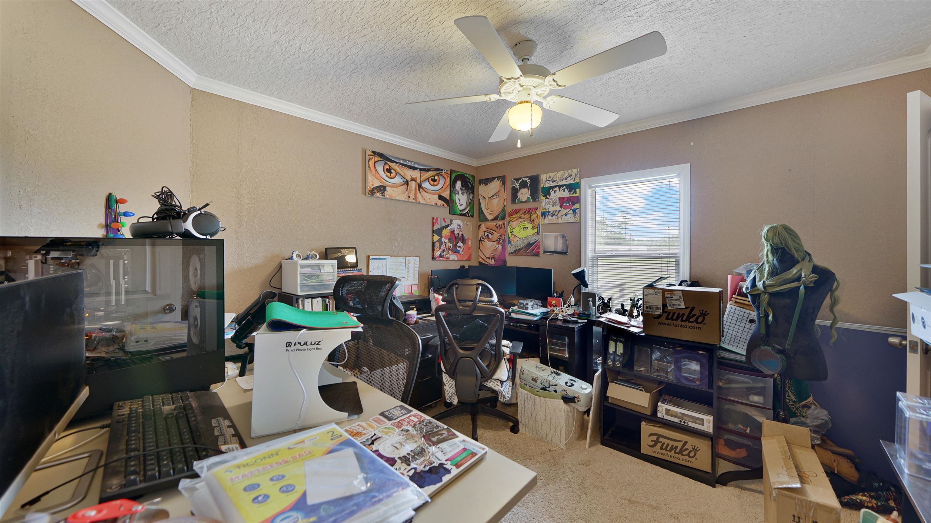 117 Jack Road Palatka, FL 32177 - Photo 23 of 34 a living room with furniture and a flat screen tv with kitchen view