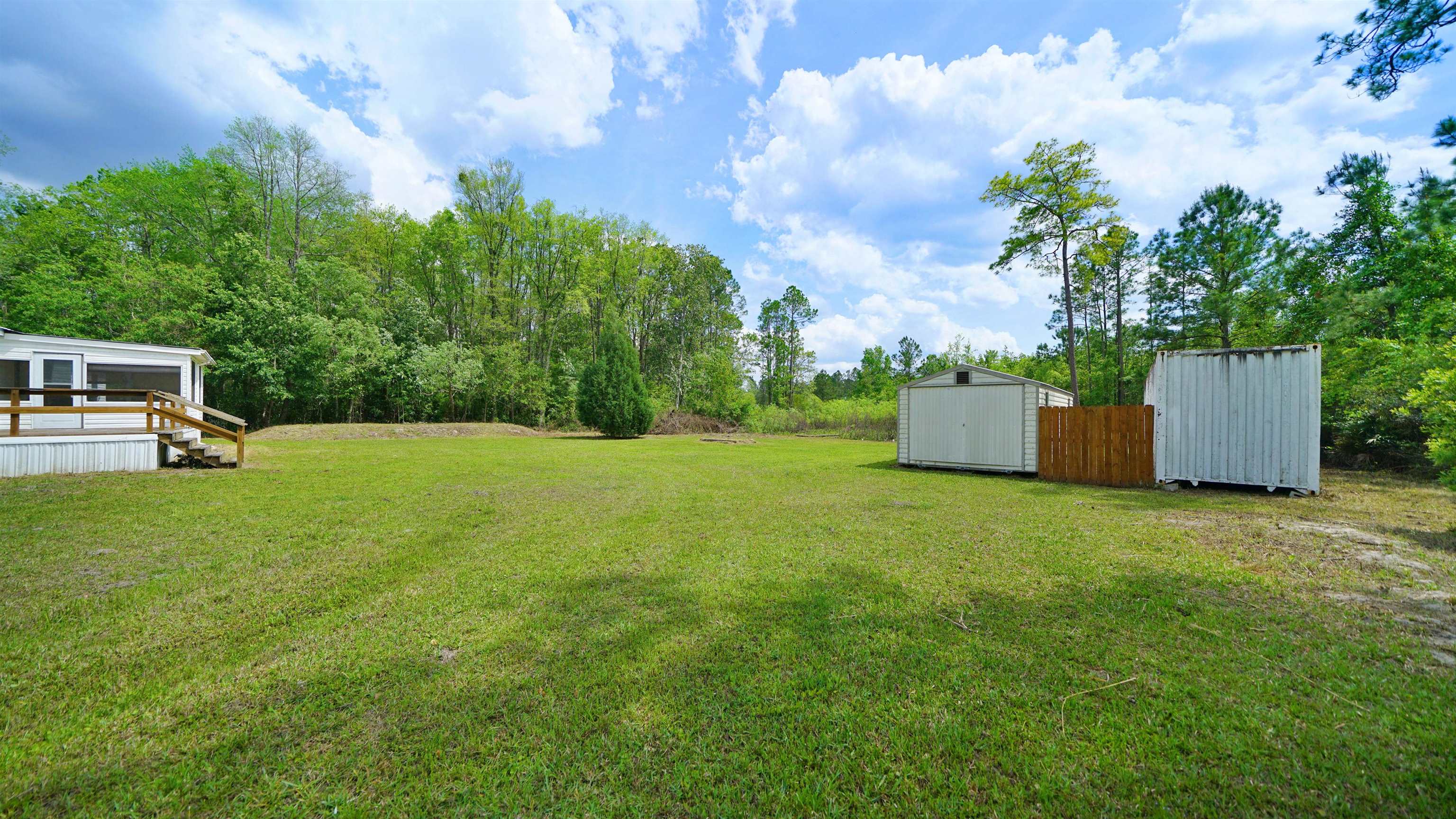 117 Jack Road Palatka, FL 32177 - Photo 30 of 34 a swimming pool with a yard