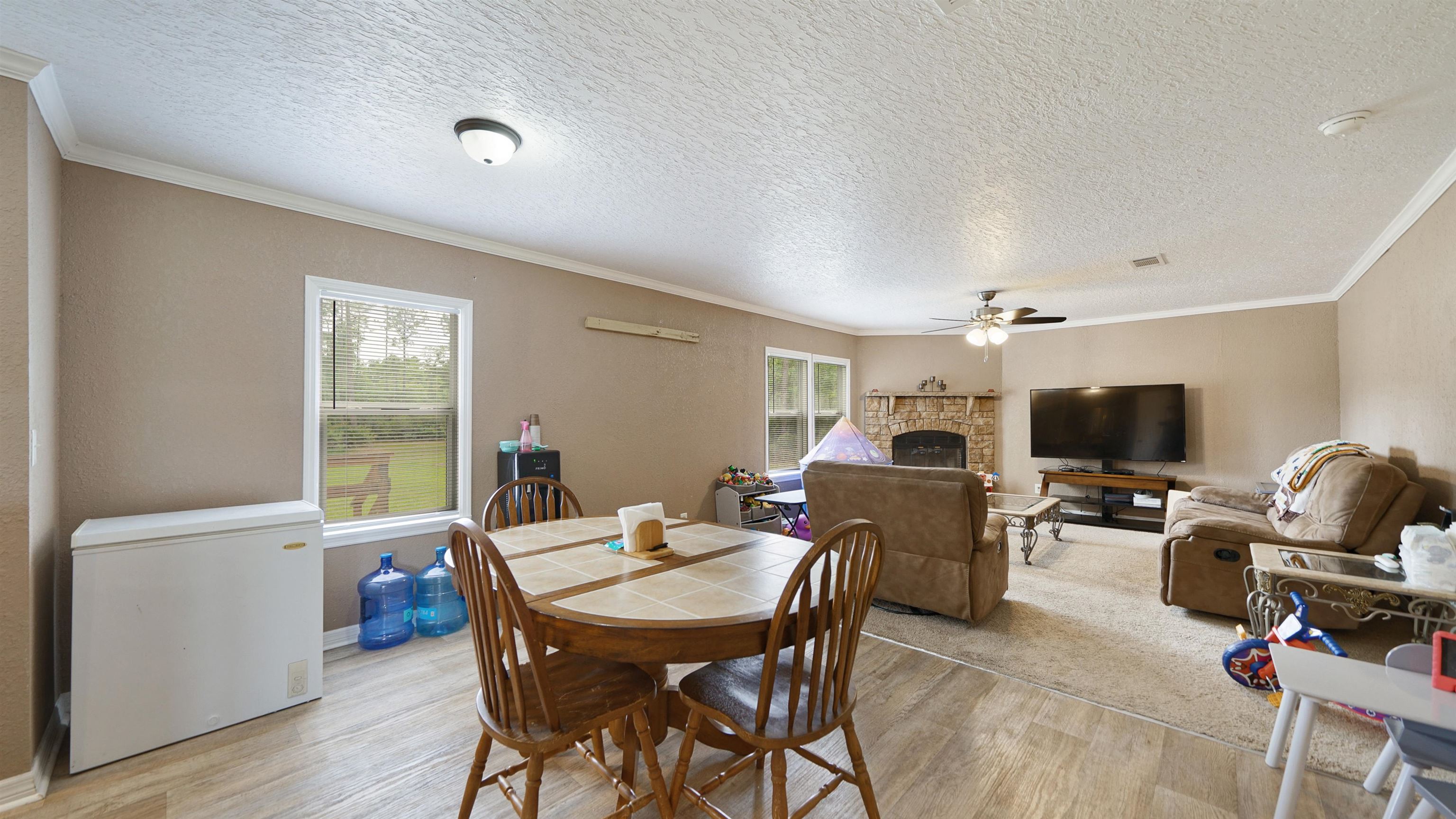 117 Jack Road Palatka, FL 32177 - Photo 6 of 34 a view of a livingroom with furniture and a window