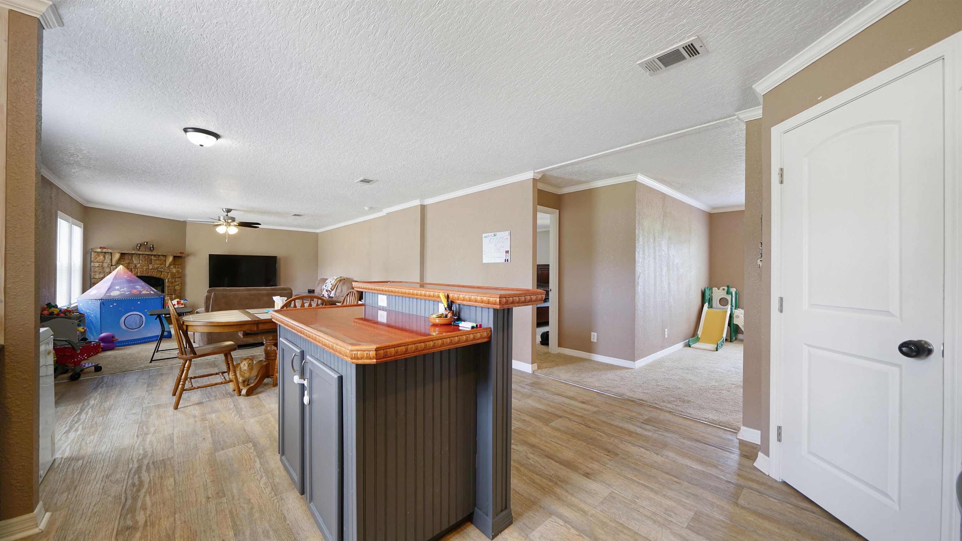 117 Jack Road Palatka, FL 32177 - Photo 10 of 34 a room with furniture and wooden floor