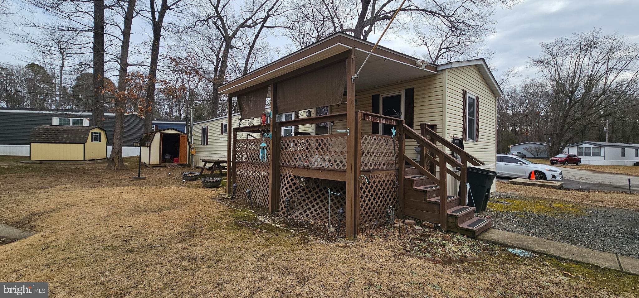 10505 Cedarville Road, Unit 1019 Brandywine, MD 20613 - Photo 2 of 15 a view of a house with wooden fence