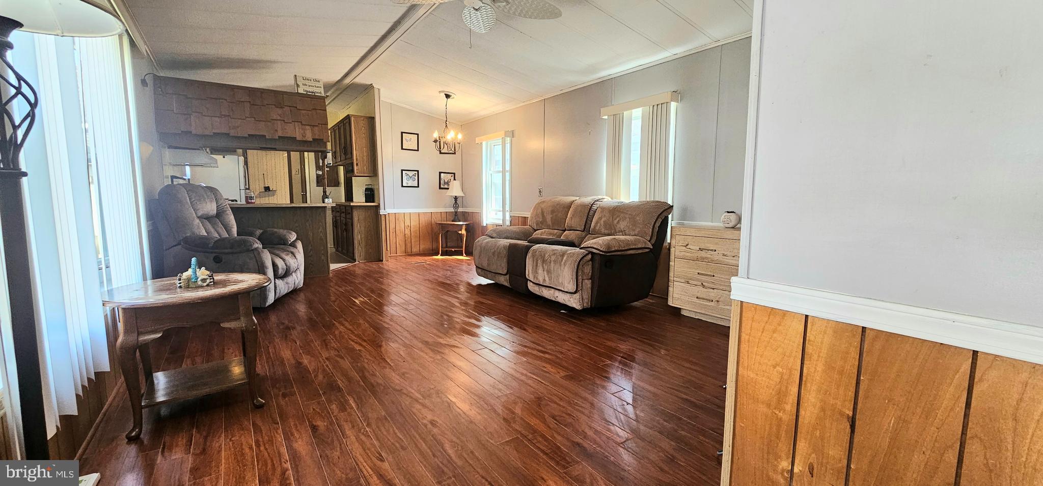 10505 Cedarville Road, Unit 1019 Brandywine, MD 20613 - Photo 3 of 15 a living room with furniture and a wooden floor