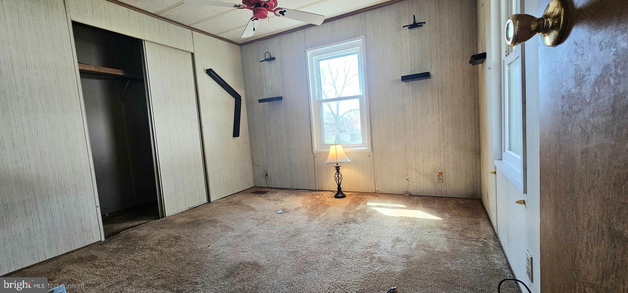 10505 Cedarville Road, Unit 1019 Brandywine, MD 20613 - Photo 6 of 15 an empty room with windows