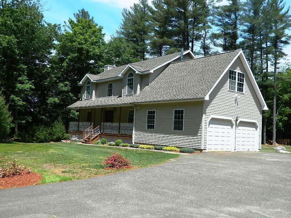 1052 Amity Road Bethany, CT 06524 - Photo 1 of 1 a view of house with outdoor space and swimming pool