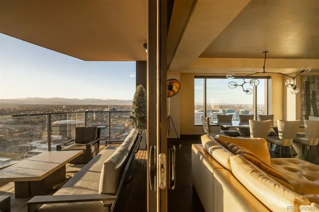a view of a balcony with city view