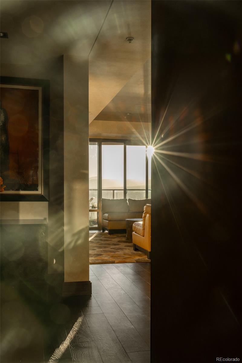 1133 14th Street, Unit 2900 Denver, CO 80202 - Photo 25 of 48 a hallway with a couch