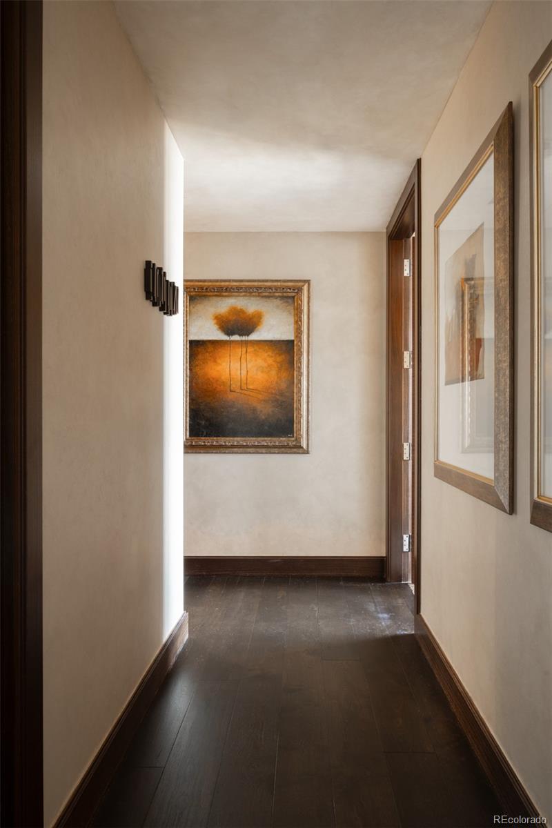 1133 14th Street, Unit 2900 Denver, CO 80202 - Photo 33 of 48 a view of a livingroom with wooden floor and a ceiling fan