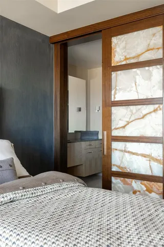 a bathroom with a tub and shower