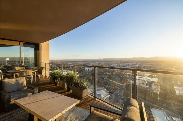a view of a balcony with lake view and mountain view
