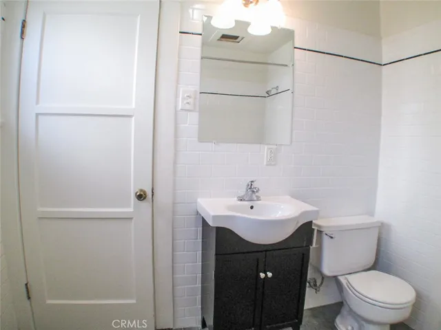 a bathroom with a shower and a bath tub