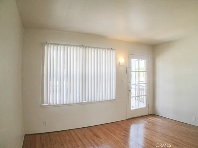 a kitchen with a stove a sink and a refrigerator