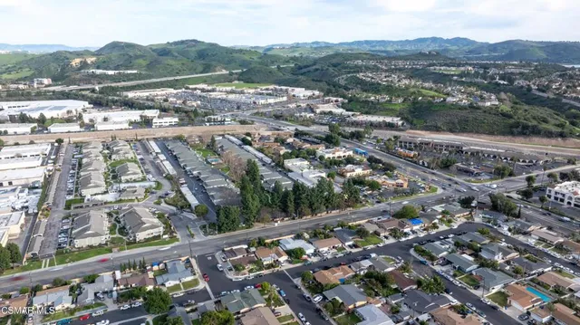 an aerial view of city parking and river