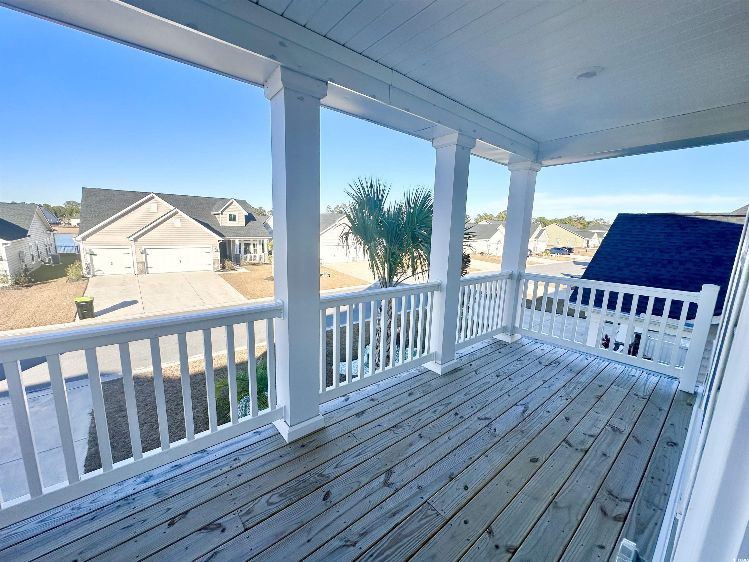 285 Augusta Grn Way Myrtle Beach, SC 29579 - Photo 15 of 28 Deck featuring a residential view