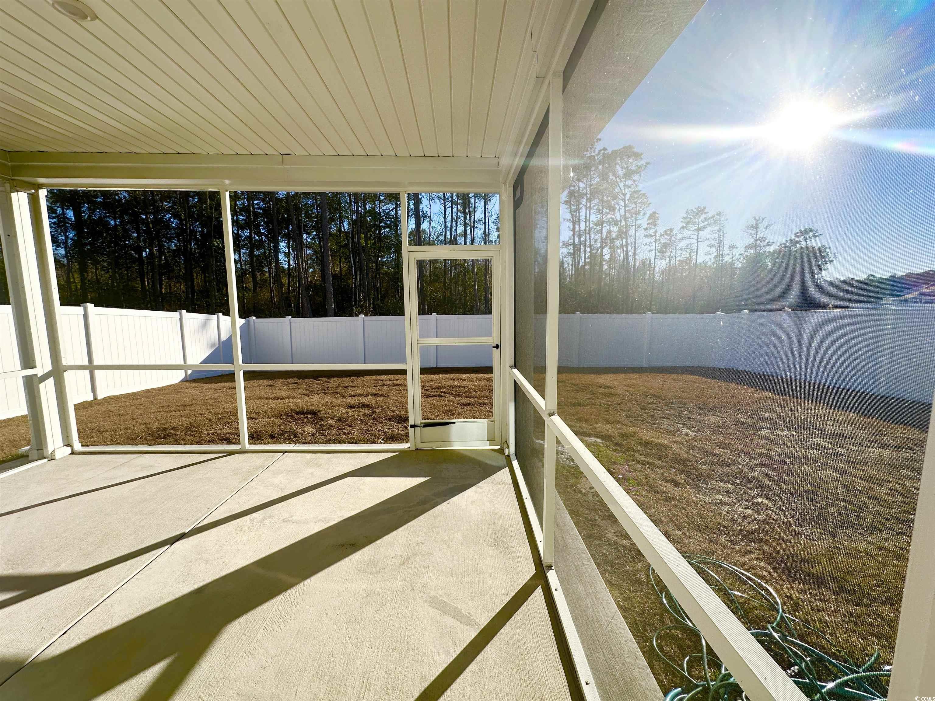 285 Augusta Grn Way Myrtle Beach, SC 29579 - Photo 23 of 28 View of unfurnished sunroom
