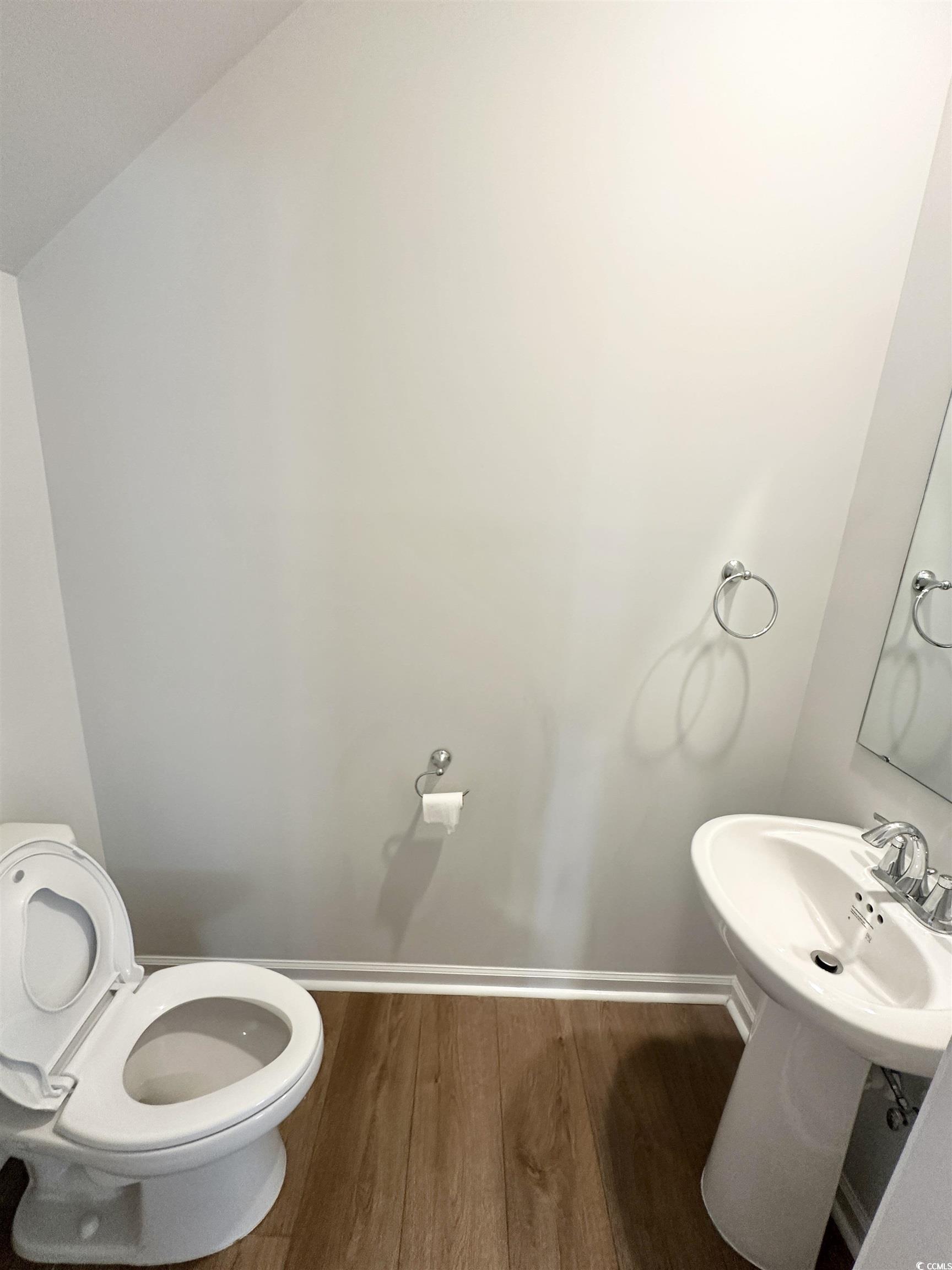 285 Augusta Grn Way Myrtle Beach, SC 29579 - Photo 7 of 28 Half bathroom featuring baseboards and wood finished floors