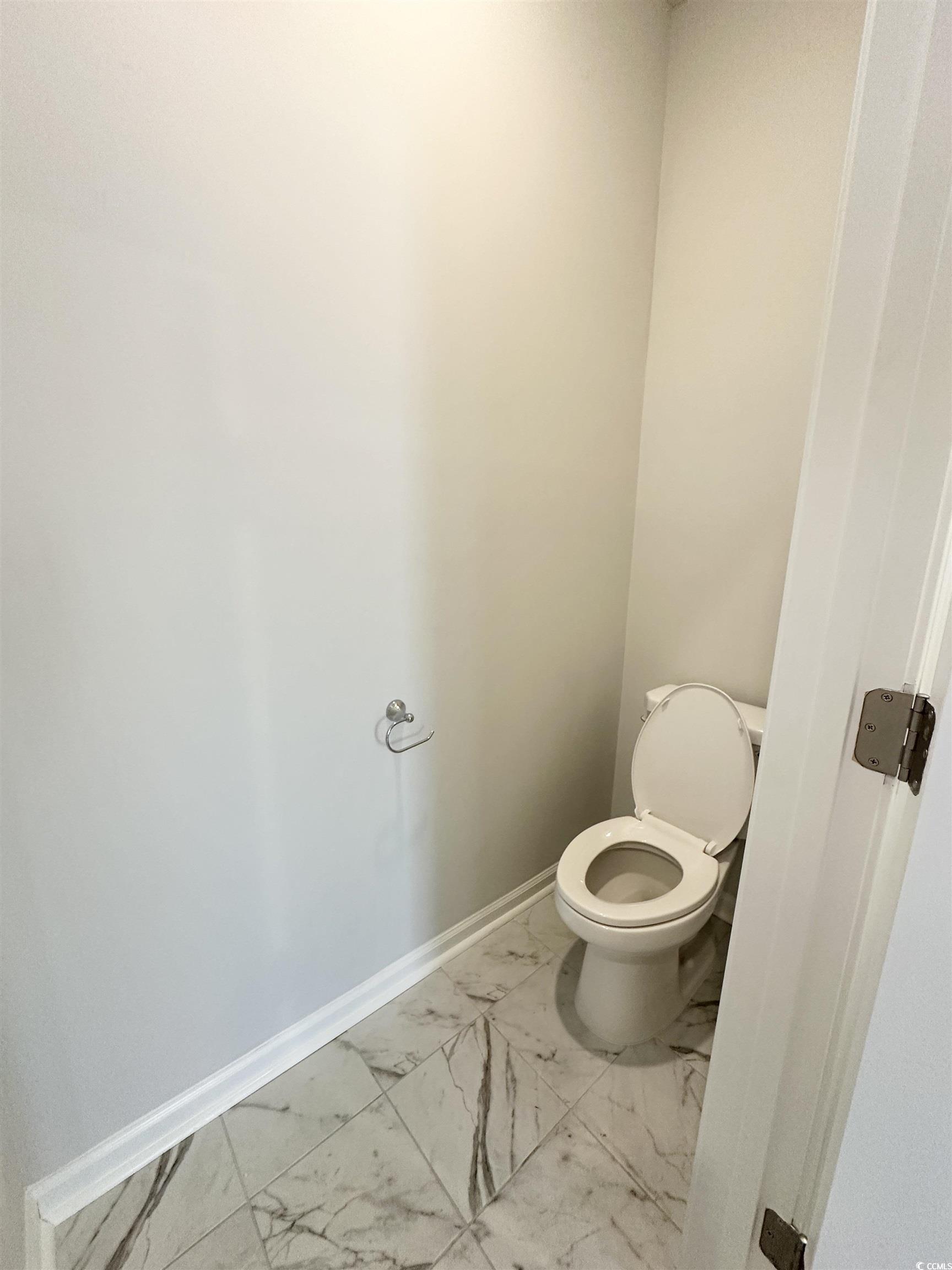 285 Augusta Grn Way Myrtle Beach, SC 29579 - Photo 10 of 28 Bathroom featuring baseboards and light marble finish floors