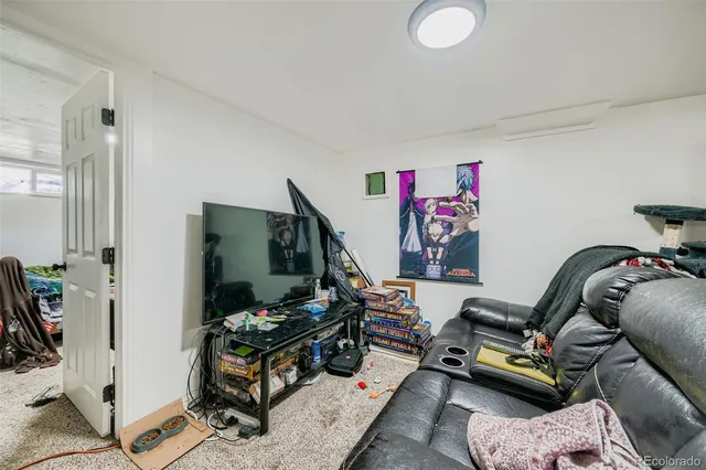 a view of a workspace with furniture