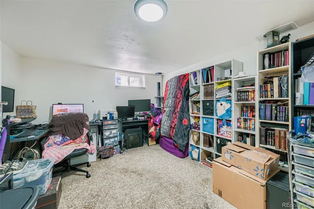 a view of a workspace with furniture