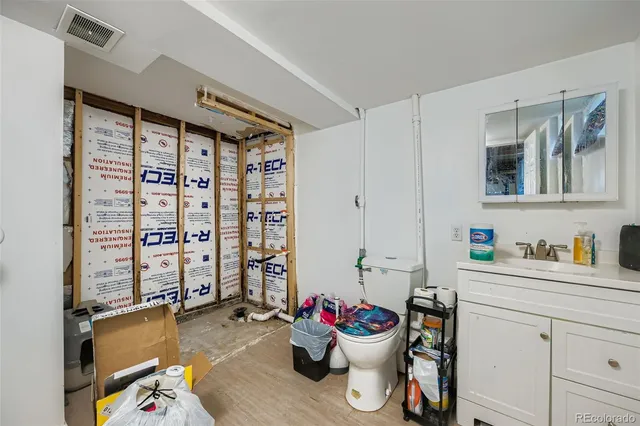 a bed room with a bed and a baby crib