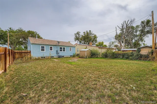 a house view with a garden space