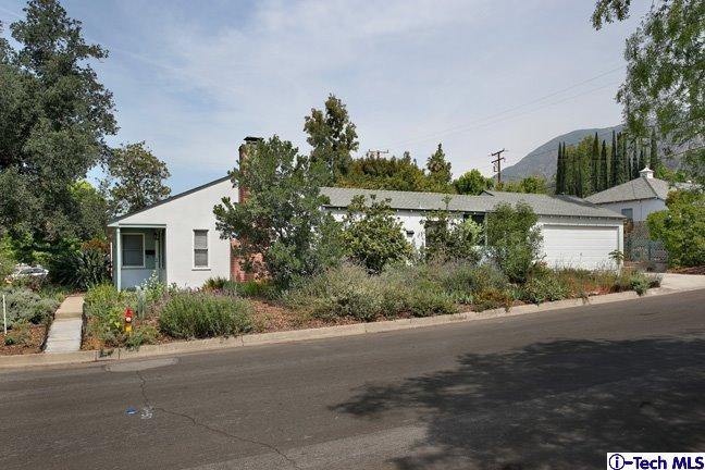 183 Marathon Road Altadena, CA 91001 - Photo 1 of 16 a view of a street with a house in the background