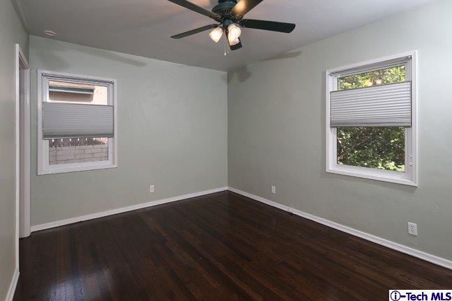 183 Marathon Road Altadena, CA 91001 - Photo 4 of 16 a view of an empty room with wooden floor and a window