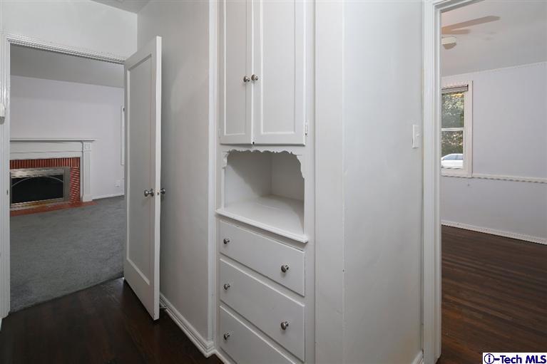 183 Marathon Road Altadena, CA 91001 - Photo 9 of 16 a room with a closet and a fireplace