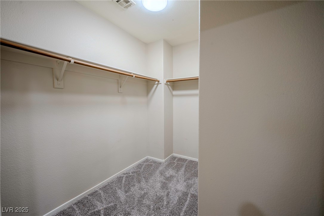 5283 Broadlake Lane Las Vegas, NV 89122 - Photo 7 of 36 Walk in closet with carpet