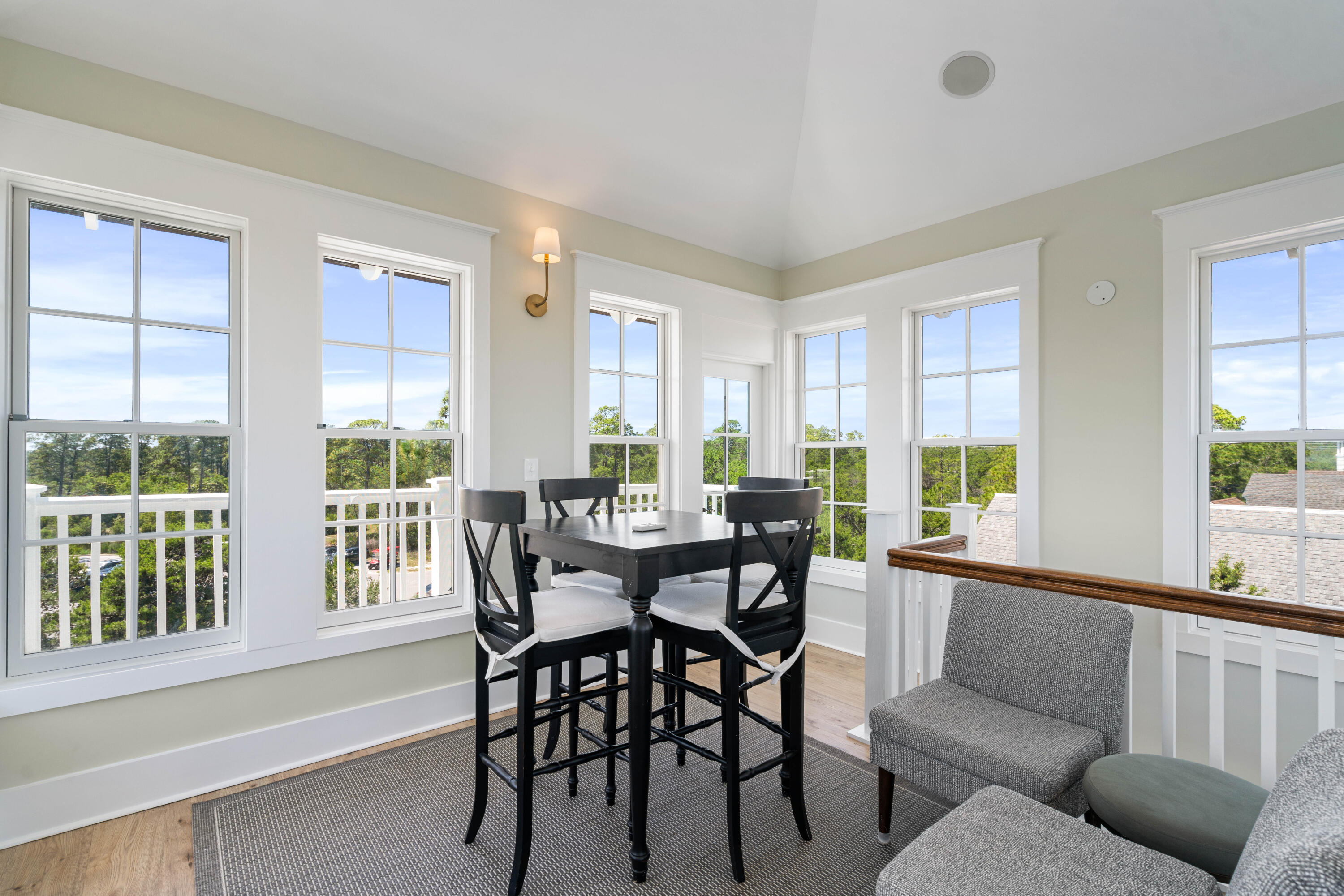 148 Coopersmith Lane Inlet Beach, FL 32461 - Photo 63 of 82 a view of a dining room with furniture large windows and wooden floor