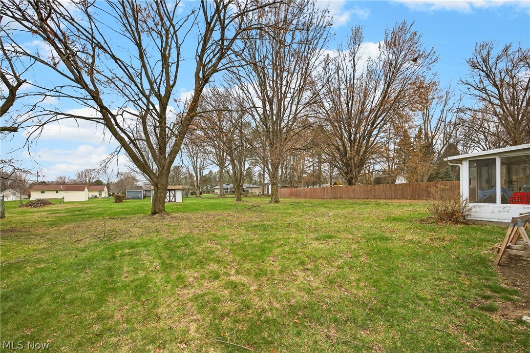 4404 Florida Street Perry, OH 44081 - Photo 23 of 24 View of yard featuring a sunroom