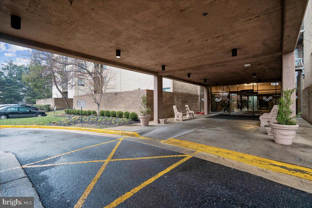 9200 Edwards Way, Unit 1202 Hyattsville, MD 20783 - Photo 22 of 34 a view of outdoor space with swimming pool