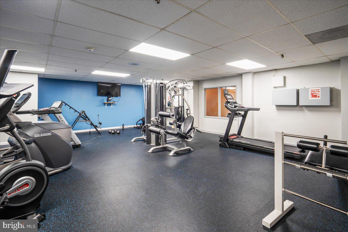 9200 Edwards Way, Unit 1202 Hyattsville, MD 20783 - Photo 27 of 34 a view of a room with gym equipment