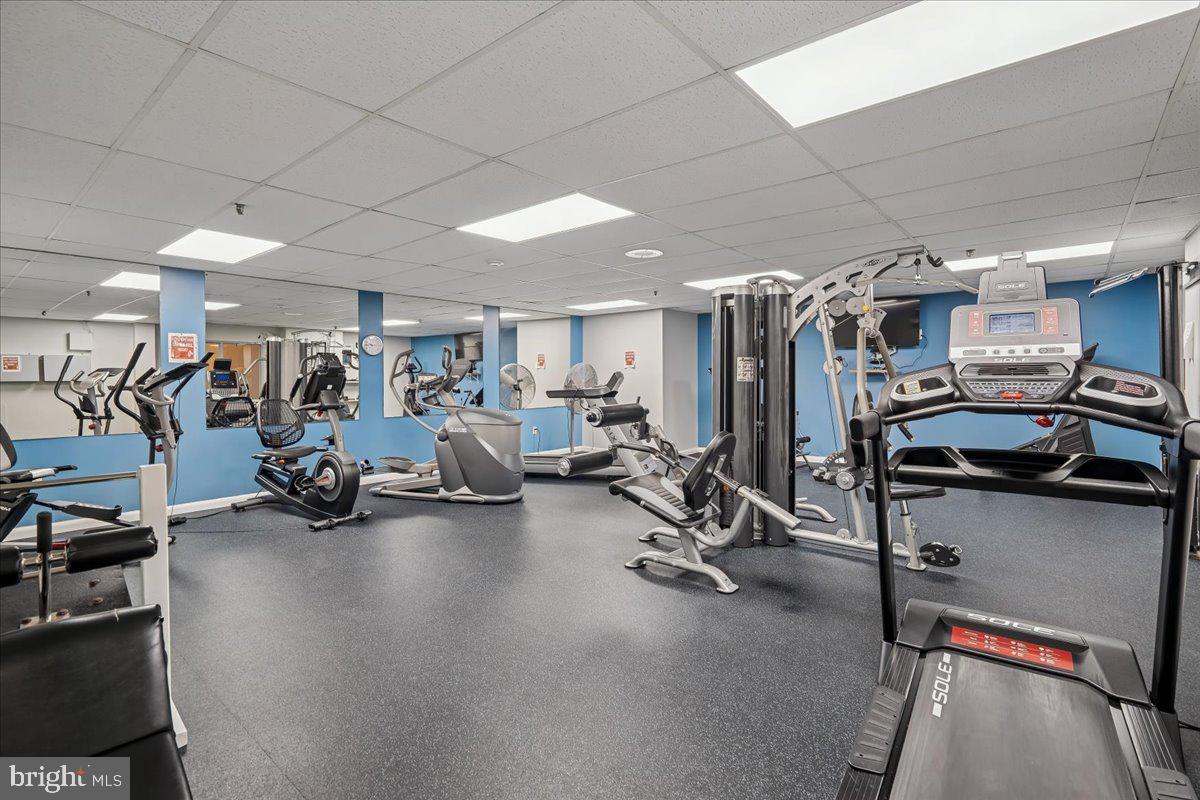 9200 Edwards Way, Unit 1202 Hyattsville, MD 20783 - Photo 28 of 34 a view of a room with gym equipment