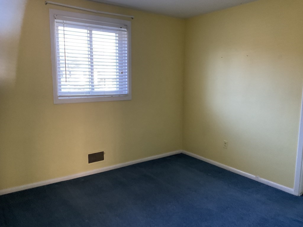 992 Pleasant Street Framingham, MA 01701 - Photo 17 of 29 an empty room with a window