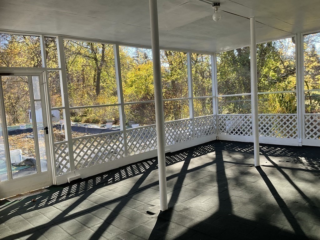 992 Pleasant Street Framingham, MA 01701 - Photo 23 of 29 a view of a porch with a bench