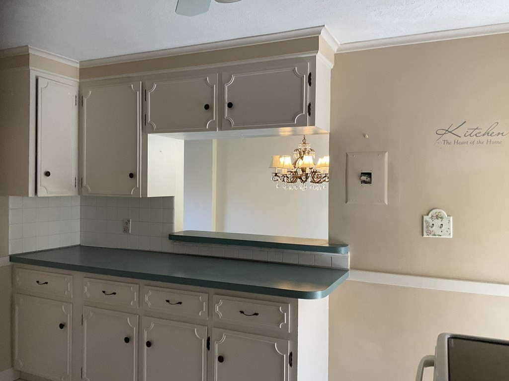 992 Pleasant Street Framingham, MA 01701 - Photo 10 of 29 a bathroom with a sink and a mirror