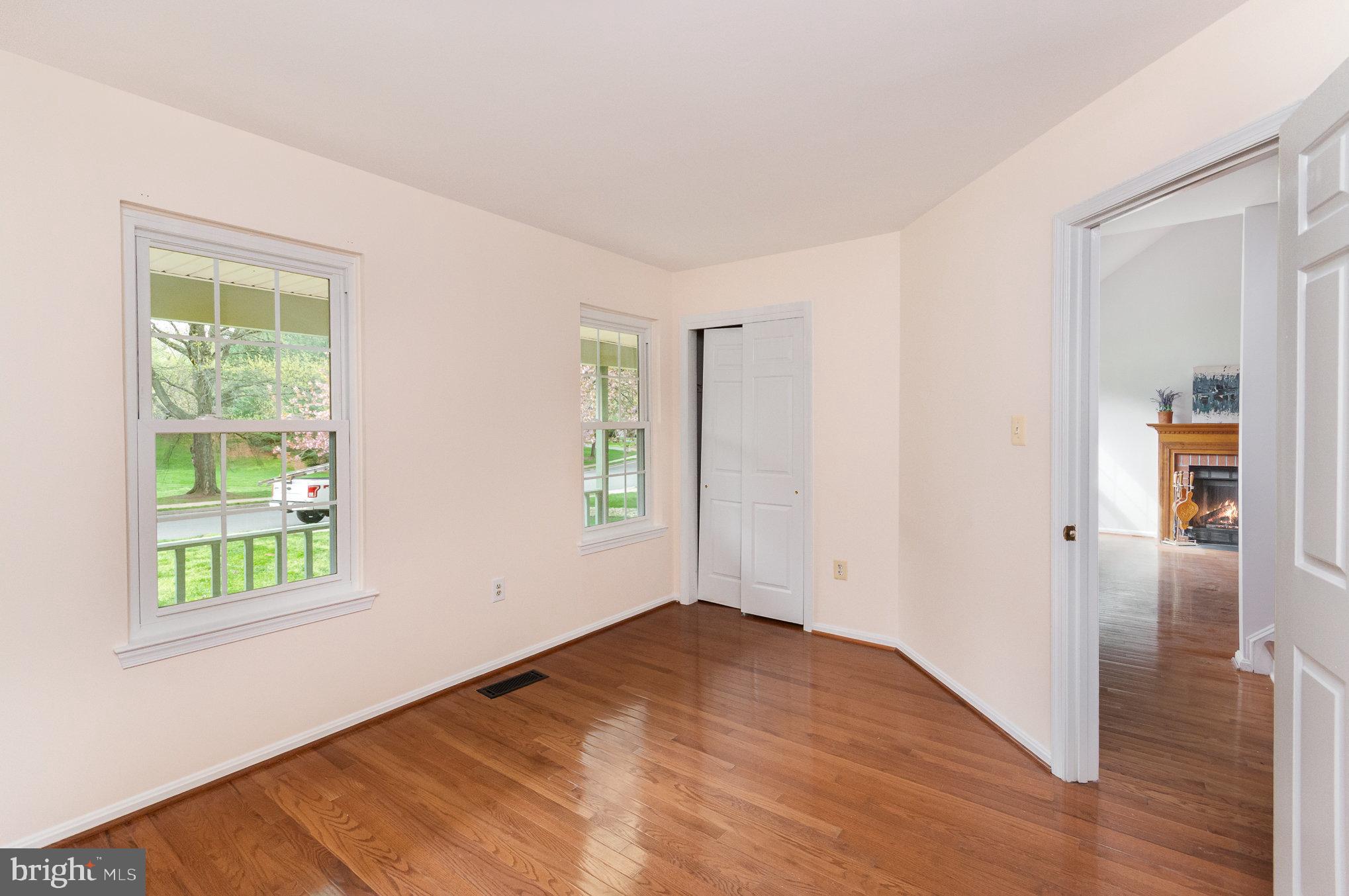 2968 Emerald Chase Drive Herndon, VA 20171 - Photo 12 of 29 wooden floor in an empty room with a window